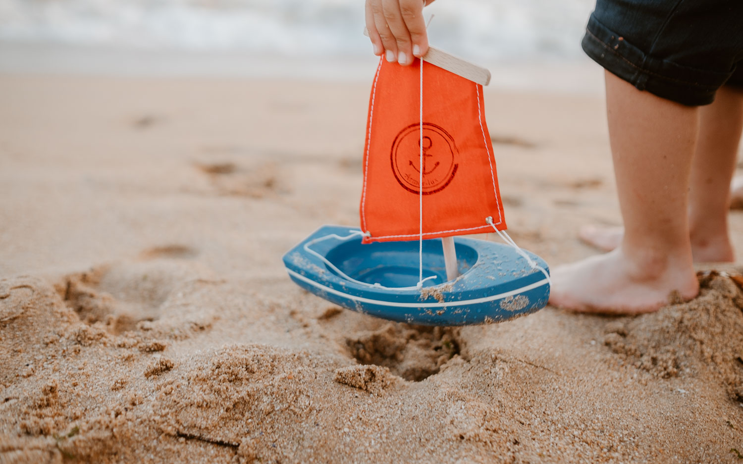 Séance photo lifestyle de famille en extérieur l’été sur la plage à Pornichet près de la Baule par Geoffrey Arnoldy photographe